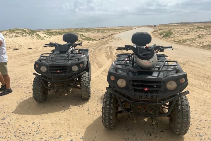 a motorcycle parked on the side of a vehicle