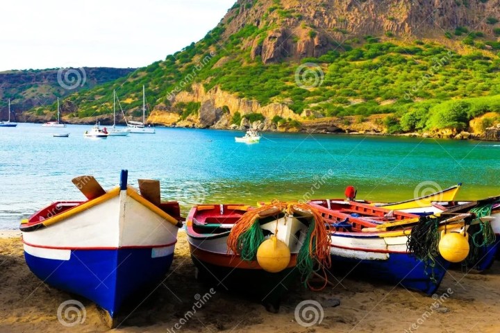 a small boat in a body of water